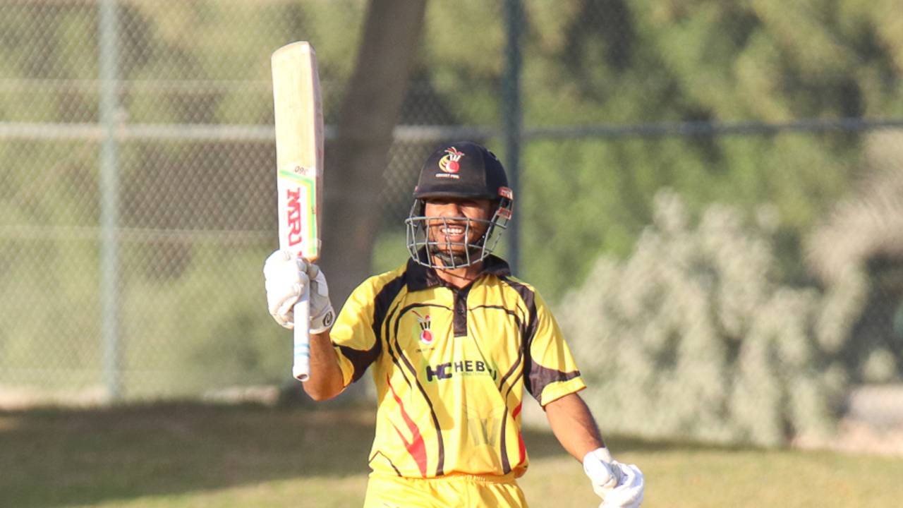 Sese Bau grins and raises his bat after reaching his maiden ODI fifty, Hong Kong v Papua New Guinea, 1st ODI, 2015-17 WCL Championship, Dubai, December 6, 2017