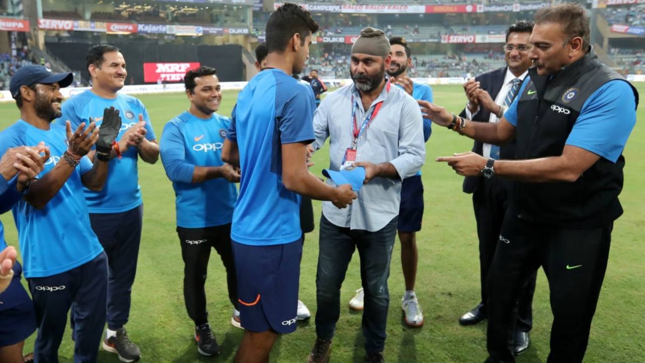 Washington Sundar receives his T20 cap from Sarandeep Singh, India v Sri Lanka, 3rd T20I, Mumbai, December 24, 2017