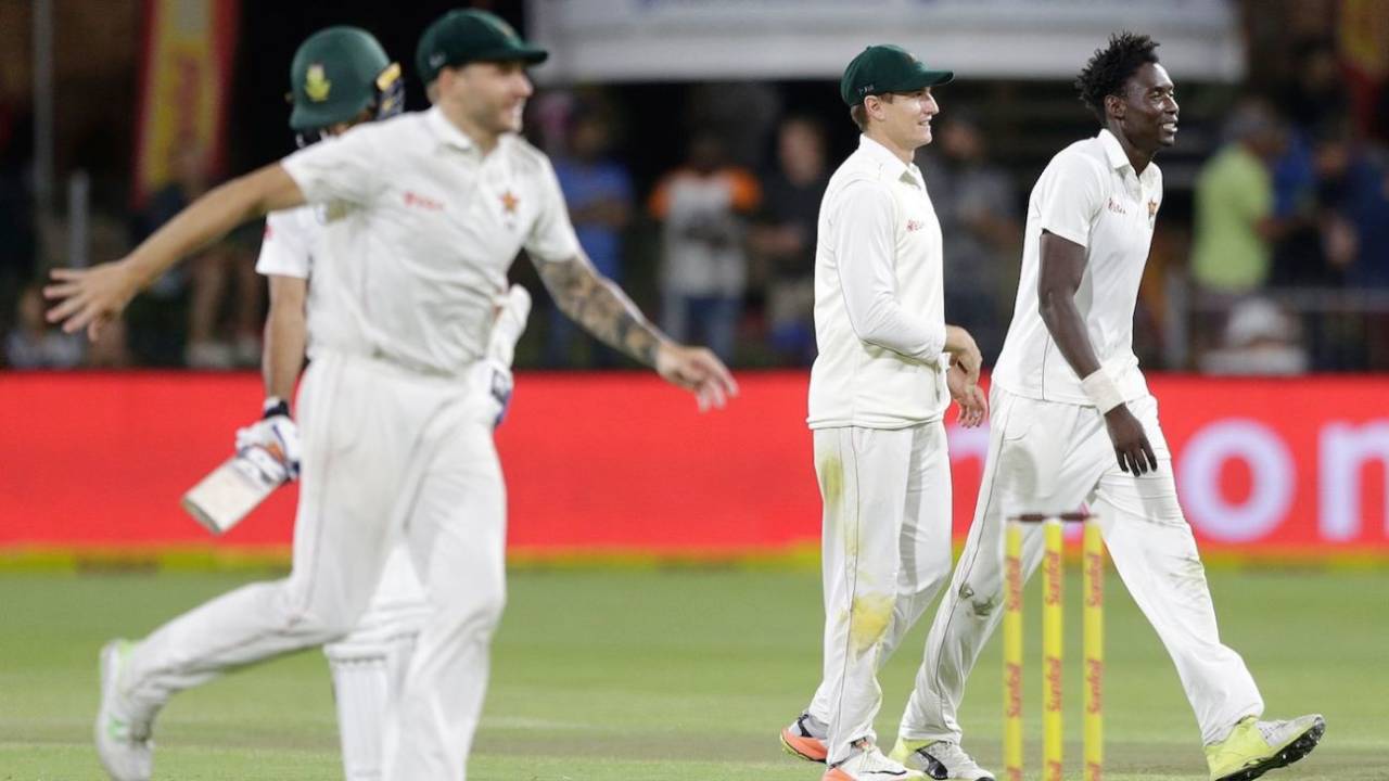 Chris Mpofu heads towards the fielder after taking a wicket, South Africa v Zimbabwe, only Test, 1st day, Port Elizabeth, December 26, 2017