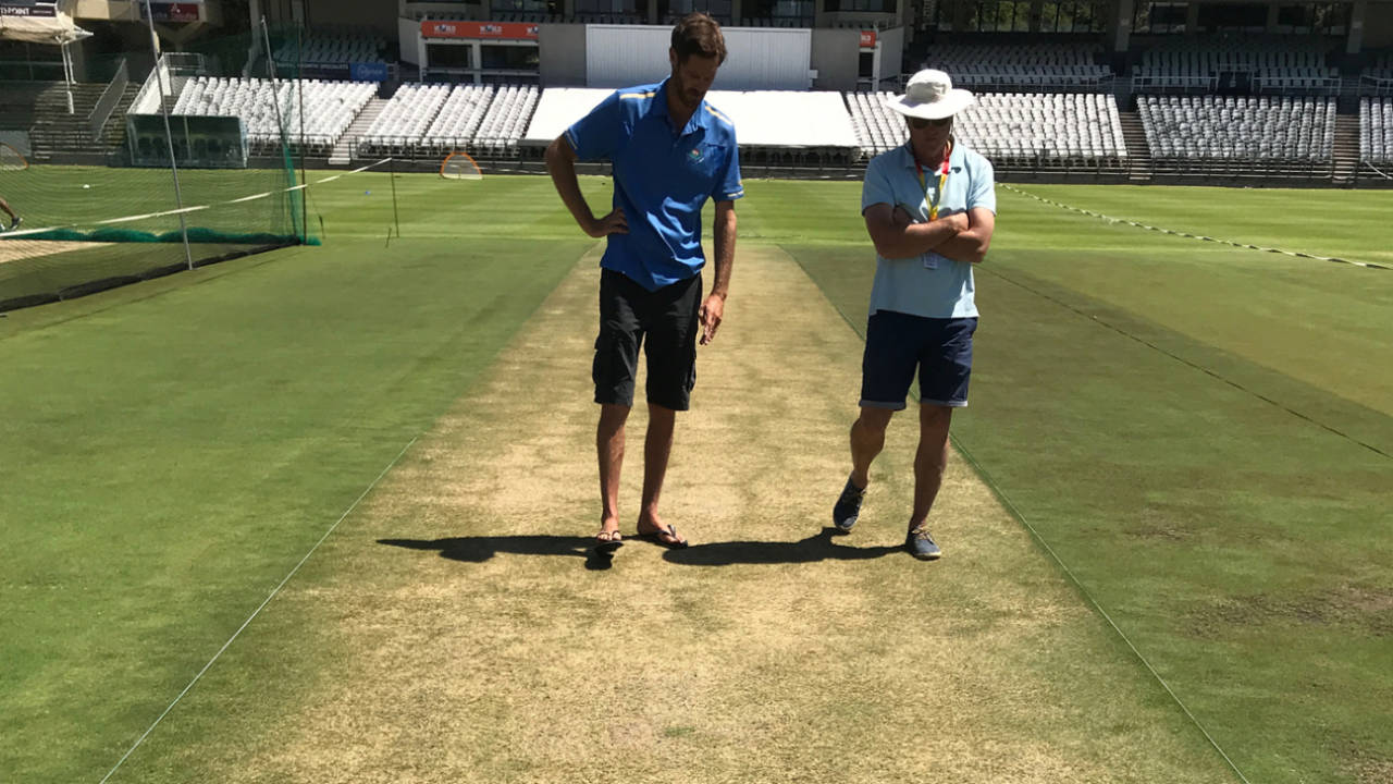 Curator Evan Flint (left) inspects the pitch at Newlands, India v South Africa, Cape Town, January 2, 2018