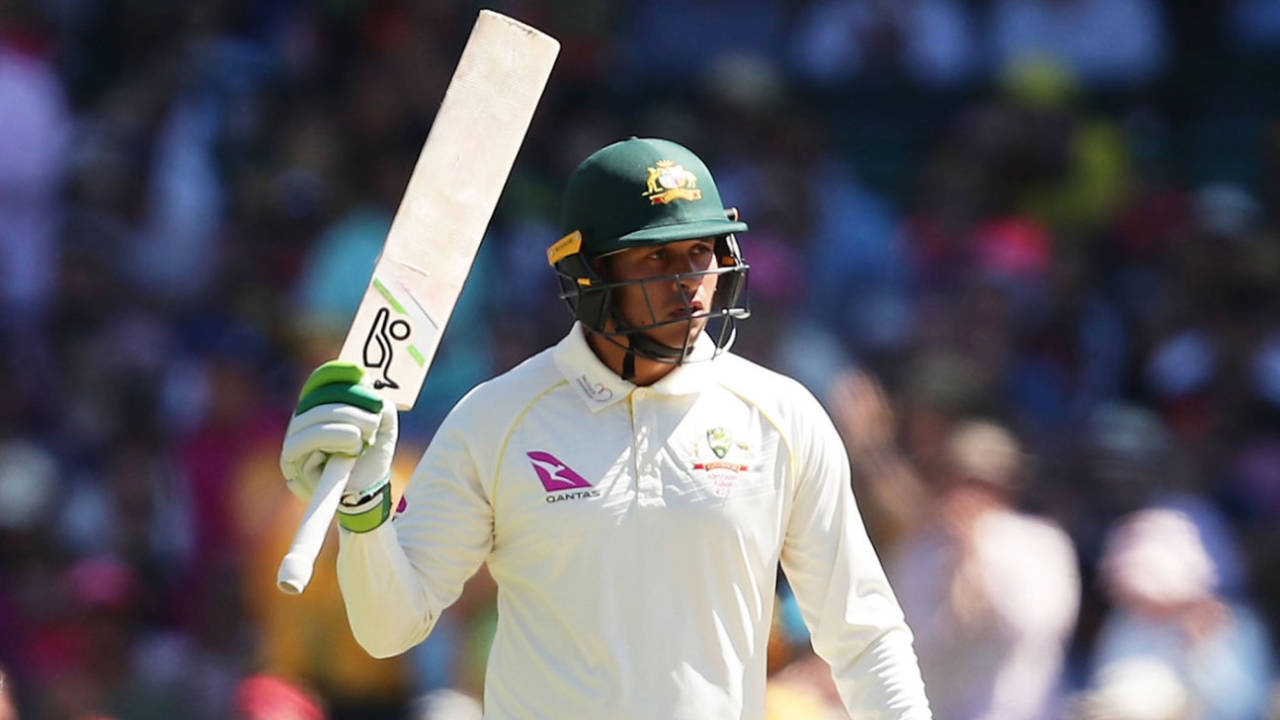 Usman Khawaja raises his bat on reaching fifty, Australia v England, 5th Ashes Test, Sydney, 2nd day, January 5, 2018