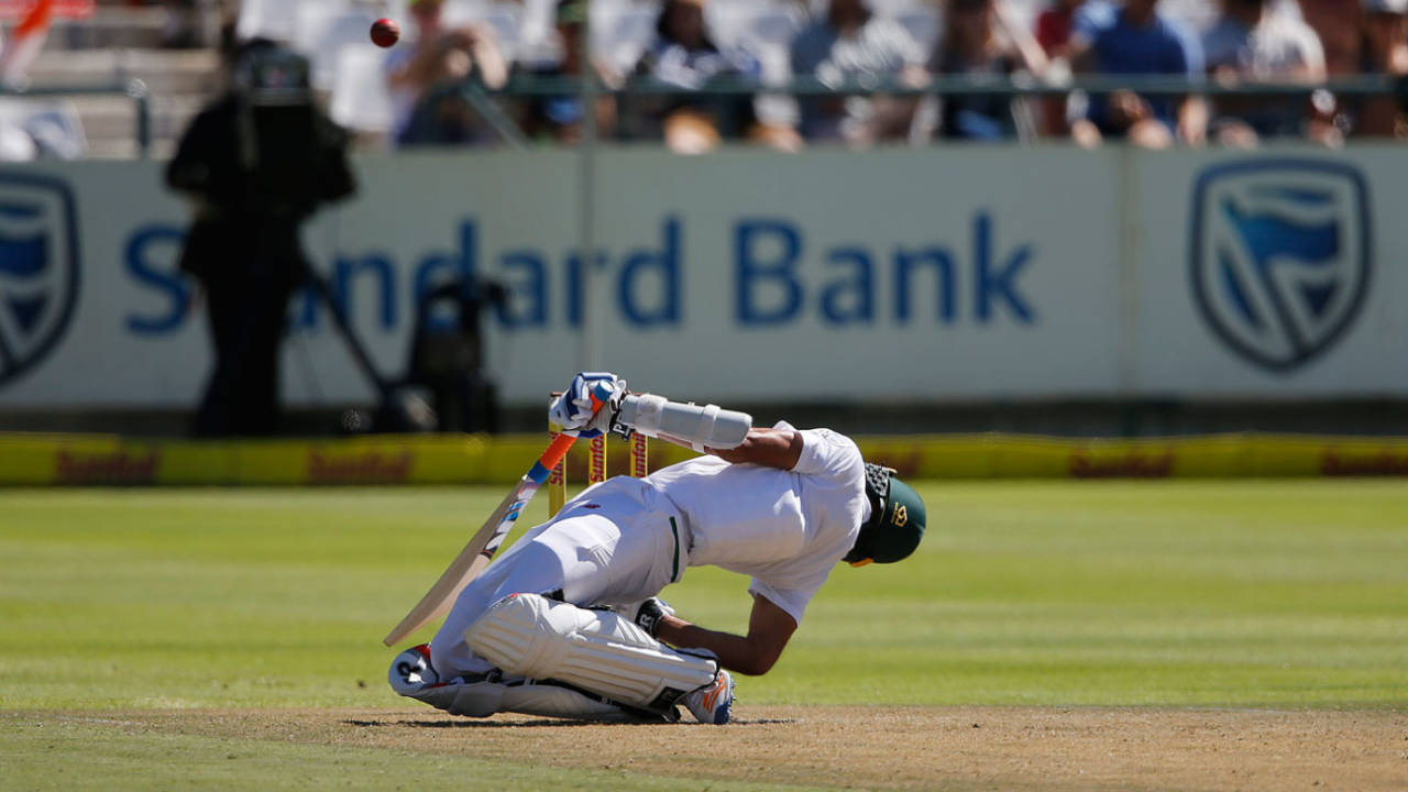 Keshav Maharaj contorts to get under a bouncer, South Africa v India, 1st Test, Cape Town, 1st day, January 5, 2017