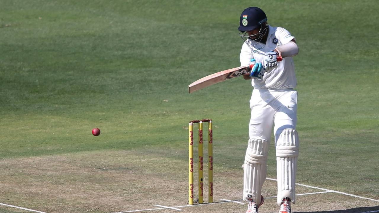 Cheteshwar Pujara stands tall to play a cut shot, South Africa v India, 3rd Test, Johannesburg, 1st day, January 24, 2018
