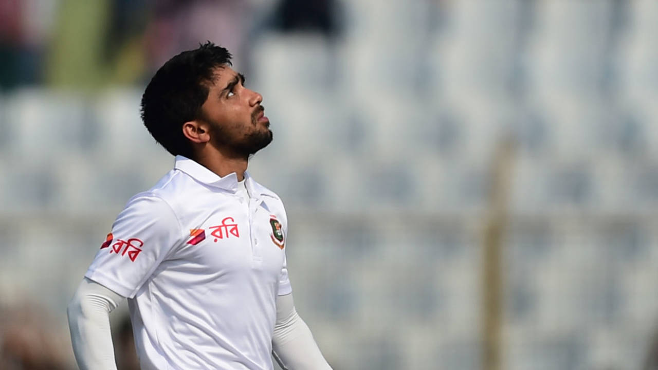 Mominul Haque looks to the skies after reaching his century&nbsp;&nbsp;&bull;&nbsp;&nbsp;Associated Press