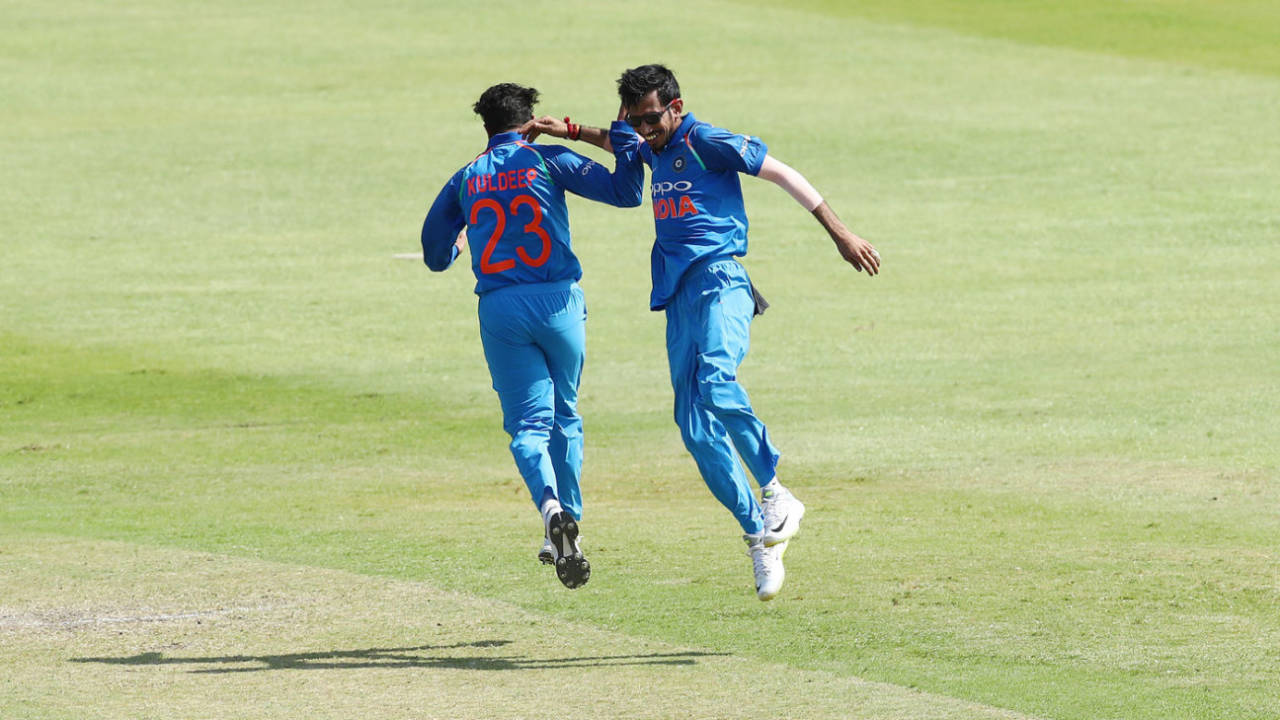 Yuzvendra Chahal and Kuldeep Yadav celebrate a wicket, South Africa v India, 1st ODI, Durban, February 1, 2018