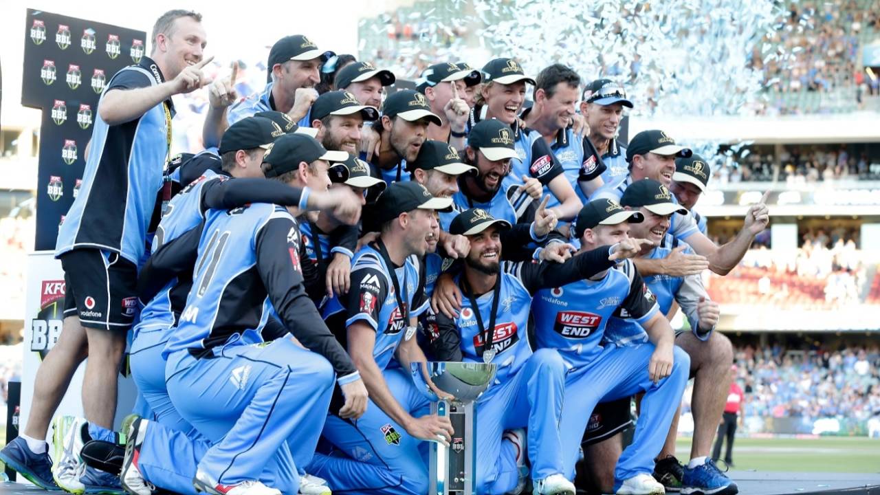 The Strikers celebrate with the BBL trophy, Adelaide Strikers v Hobart Hurricanes, BBL 2017-18, final, Adelaide, February 4, 2018