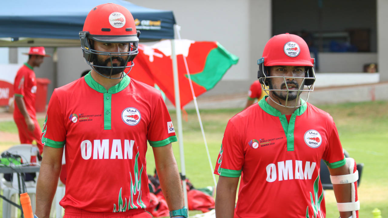 Jatinder Singh and Swapnil Khadye cross the rope for the start of play, Canada v Oman, ICC World Cricket League Division Two, Windhoek, February 8, 2018