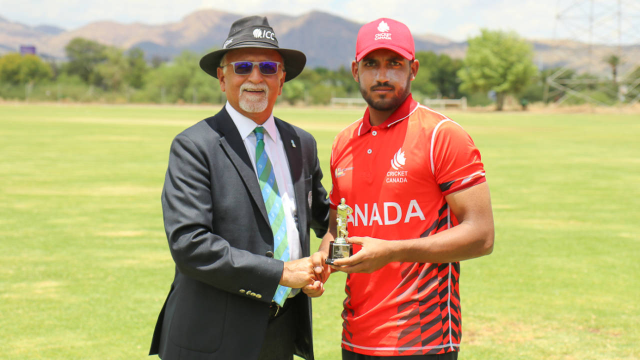 Nikhil Dutta accepts the Man of the Match award from ICC match referee Dev Govindjee, Canada v Oman, ICC World Cricket League Division Two, Windhoek, February 8, 2018