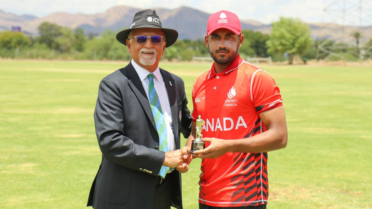 Nikhil Dutta accepts the Man of the Match award from ICC match referee Dev Govindjee, Canada v Oman, ICC World Cricket League Division Two, Windhoek, February 8, 2018