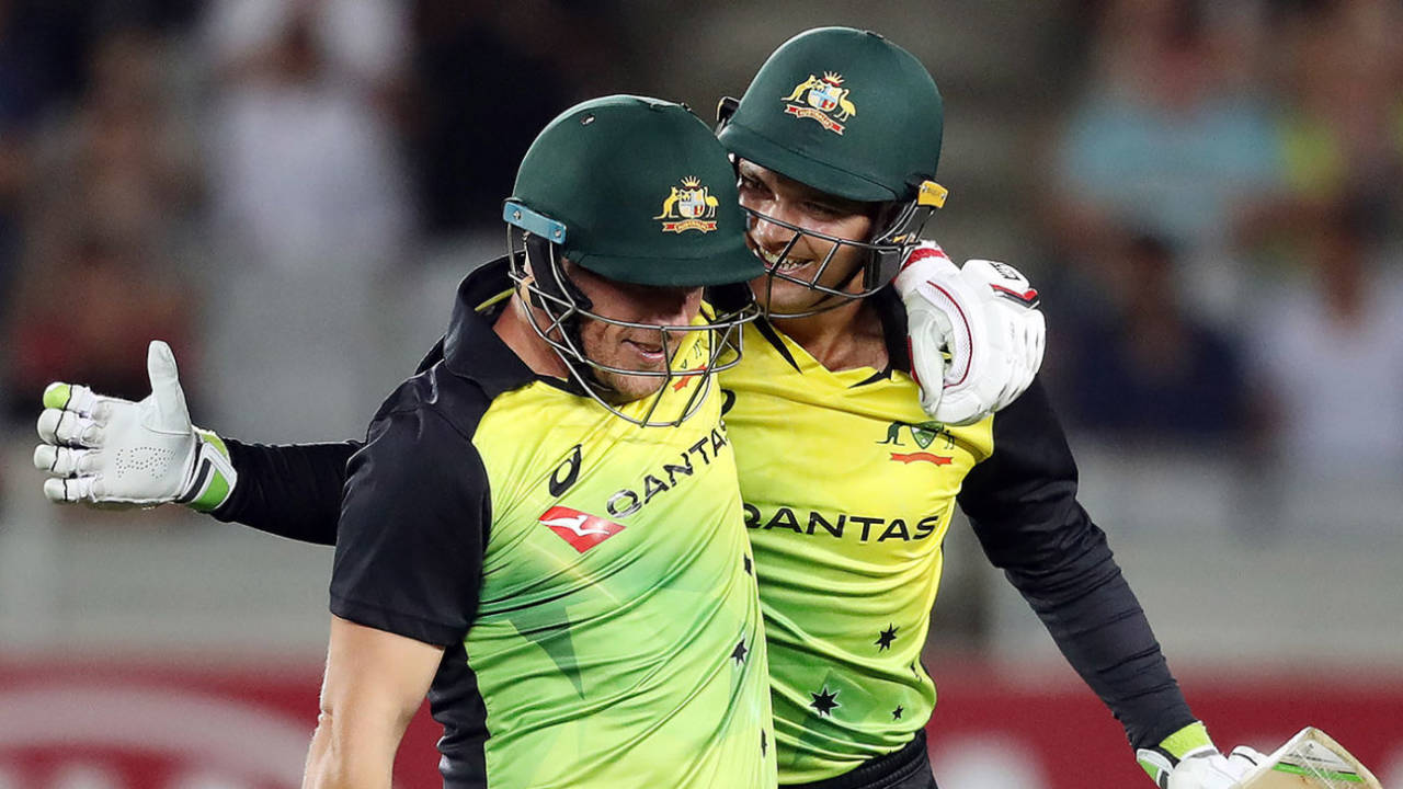 Aaron Finch and Alex Carey celebrate Australia's record-breaking win, New Zealand v Australia, Trans-Tasman T20 tri-series, Auckland, February 16, 2018