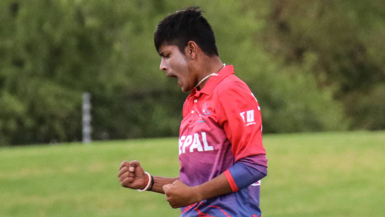 Sandeep Lamichhane pumps his fists after taking a wicket, Nepal v Oman, ICC World Cricket League Division Two, Windhoek, February 9, 2018