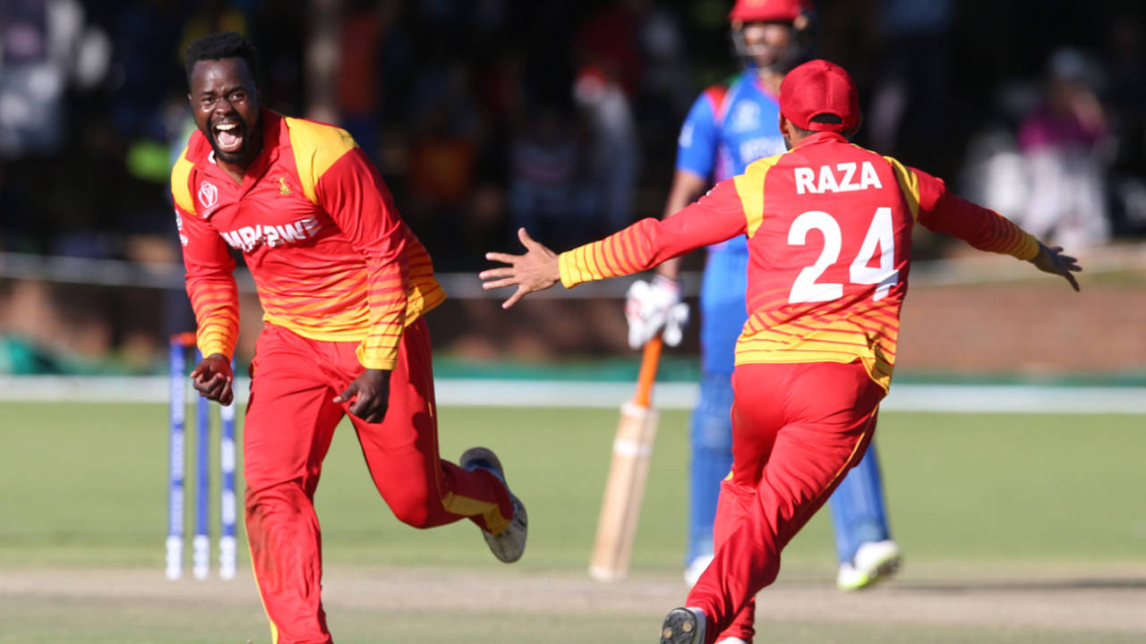 Brian Vitori and Sikandar Raza rejoice at the fall of the final wicket, Zimbabwe v Afghanistan, Bulawayo, March 6, 2018