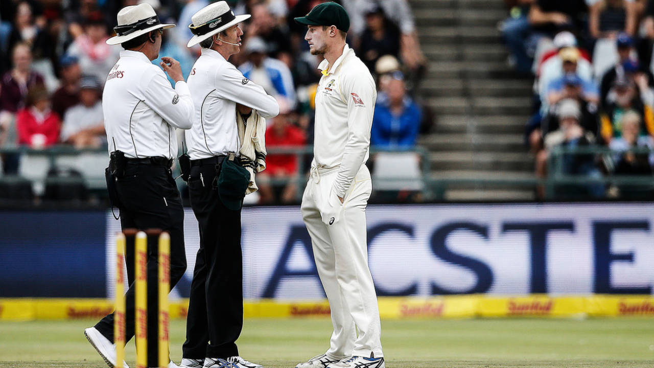 The umpires have a chat with Cameron Bancroft about working on the ball, South Africa v Australia, 3rd Test, Cape Town, 3rd day, March 24, 2018