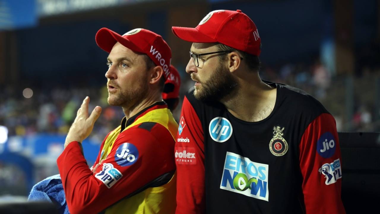 Brendon McCullum and Daniel Vettori have a chat at the dug-out, Mumbai Indians v Royal Challengers Bangalore, IPL 2018, Mumbai, April 17, 2018