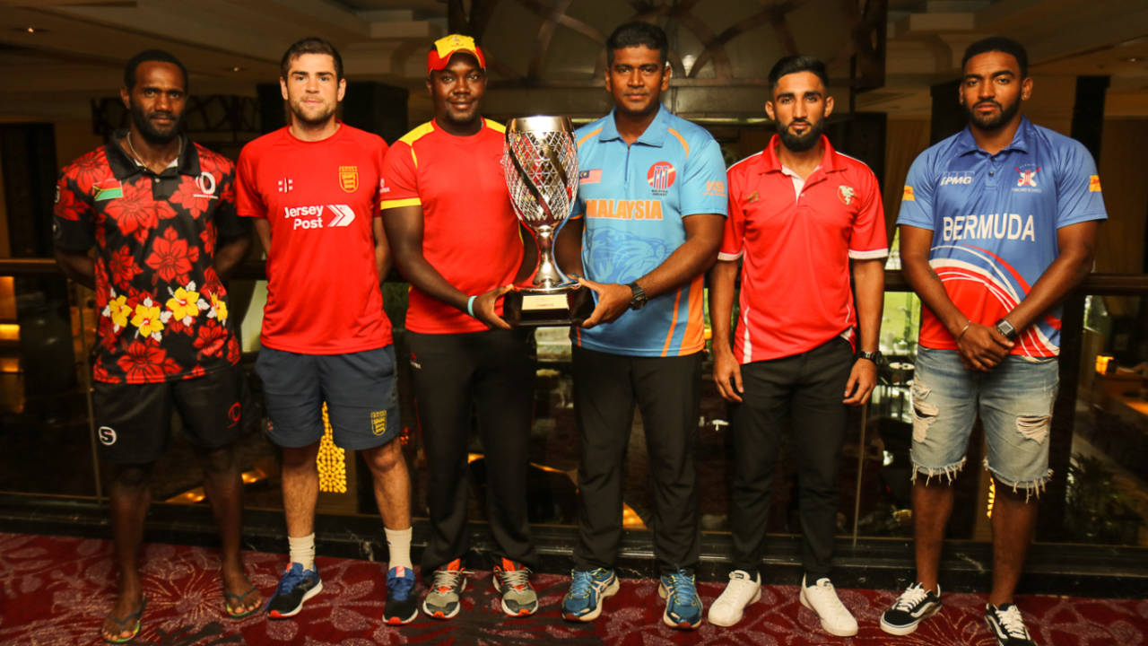 The six captains pose with the WCL Division Four tournament trophy, Kuala Lumpur, April 28, 2018