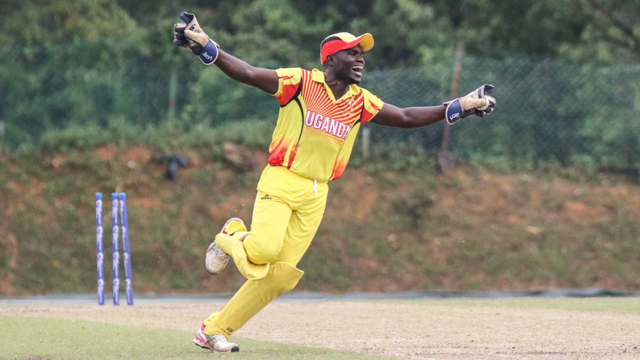 Fred Achelam runs off in celebration after completing the runout to clinch victory, Denmark v Uganda, ICC World Cricket League Division Four, Kuala Lumpur, May 3, 2018