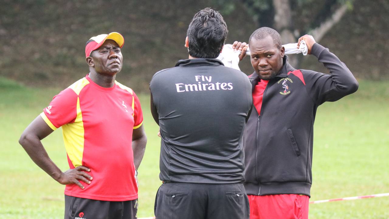 Coach Steve Tikolo and captain Roger Mukasa are stoic after rain denied Uganda victory