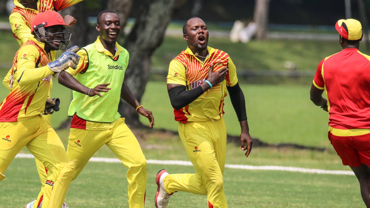 Uganda captain Roger Mukasa sprints off after taking the final wicket to secure victory, Jersey v Uganda, ICC World Cricket League Division Four, Bangi, May 6, 2018