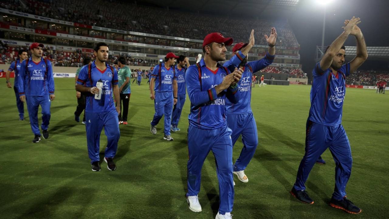 Asghar Stanikzai and Rashid Khan lead the lap of honour, Afghanistan v Bangladesh, 3rd T20I, Dehradun, June 7, 2018