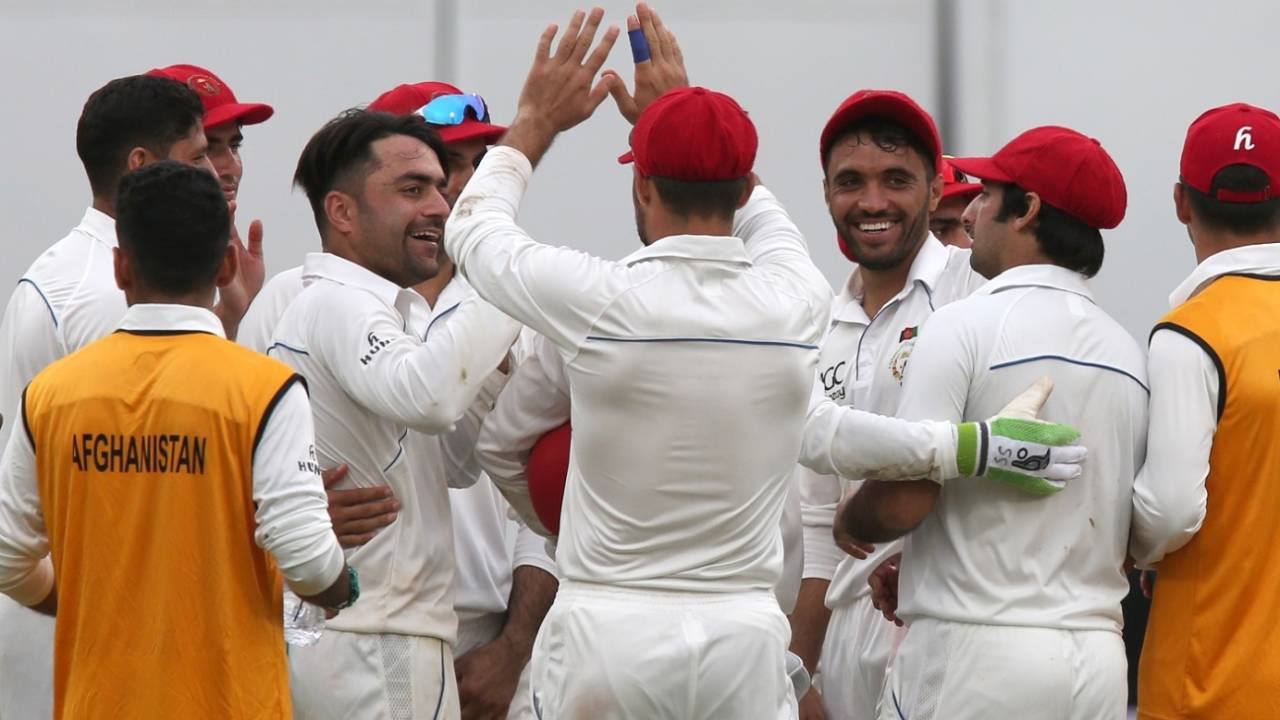 Rashid Khan celebrates Ajinkya Rahane's wicket, India v Afghanistan, Only Test, Bengaluru, 1st day, June 14, 2018