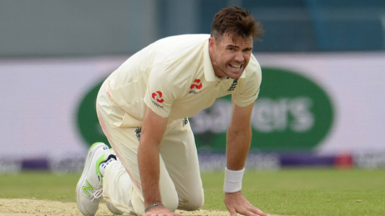 James Anderson grimaces, kneeling on the pitch, England v Pakistan, 2nd Test, day three, Headingley, June 3, 2018