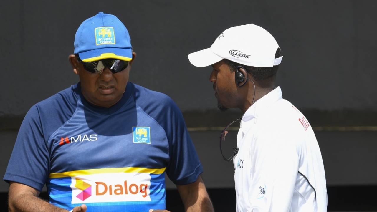 Sri Lanka team manager Asanka Gurusinha speaks with a match official, West Indies v Sri Lanka, 2nd Test, Gros Islet, 3rd day, June 16, 2018