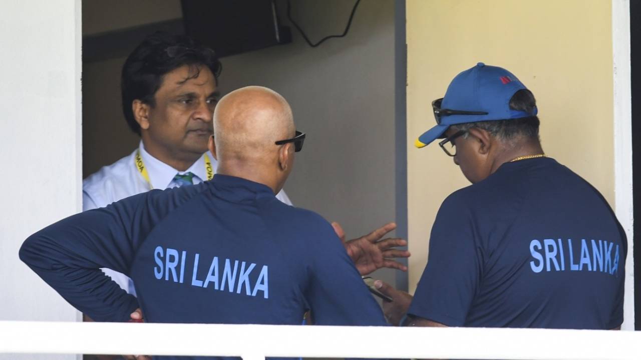 Match referee Javagal Srinath in conversation with Sri Lanka coach Chandika Hathurusingha&nbsp;&nbsp;&bull;&nbsp;&nbsp;AFP