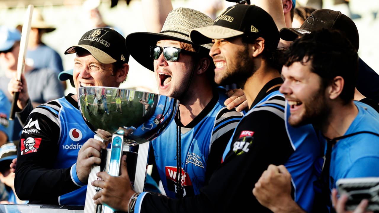 Colin Ingram (extreme left) celebrates the Adelaide Strikers' BBL win with team-mates and fans, Adelaide, February 4, 2018