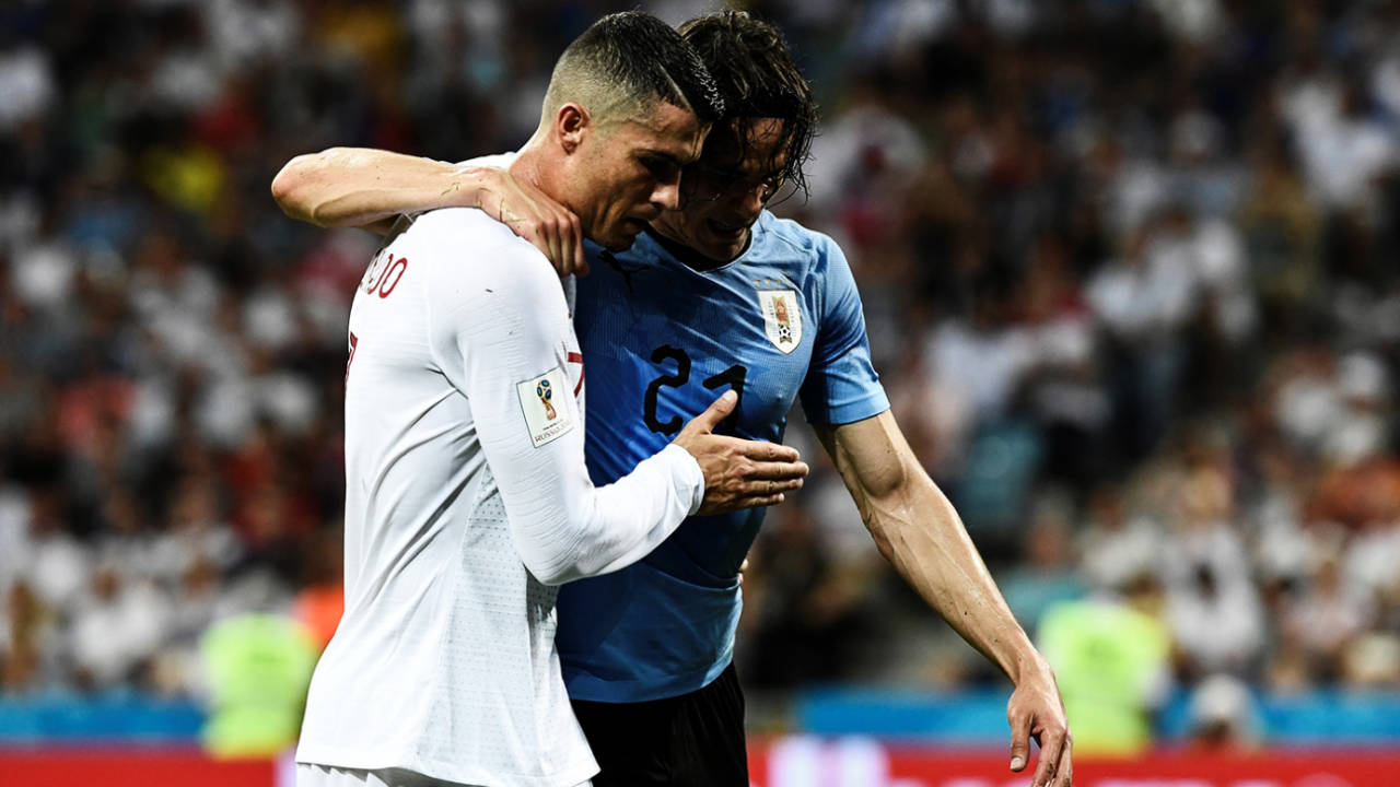 Cristiano Ronaldo helps Edinson Cavani off the field, Portugal v Uruguay, FIFA World Cup, June 30, 2018