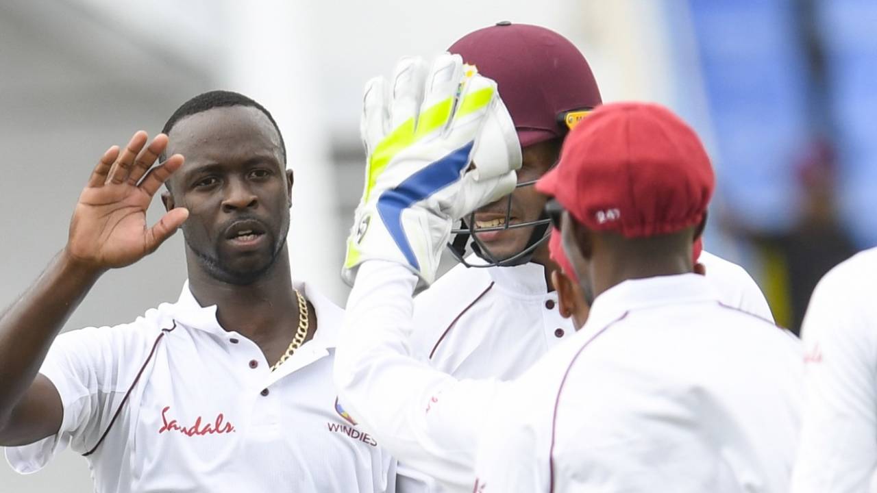 Kemar Roach celebrates a wicket with his team-mates, West Indies v Bangladesh, 1st Test, North Sound, 1st day, July 4, 2018