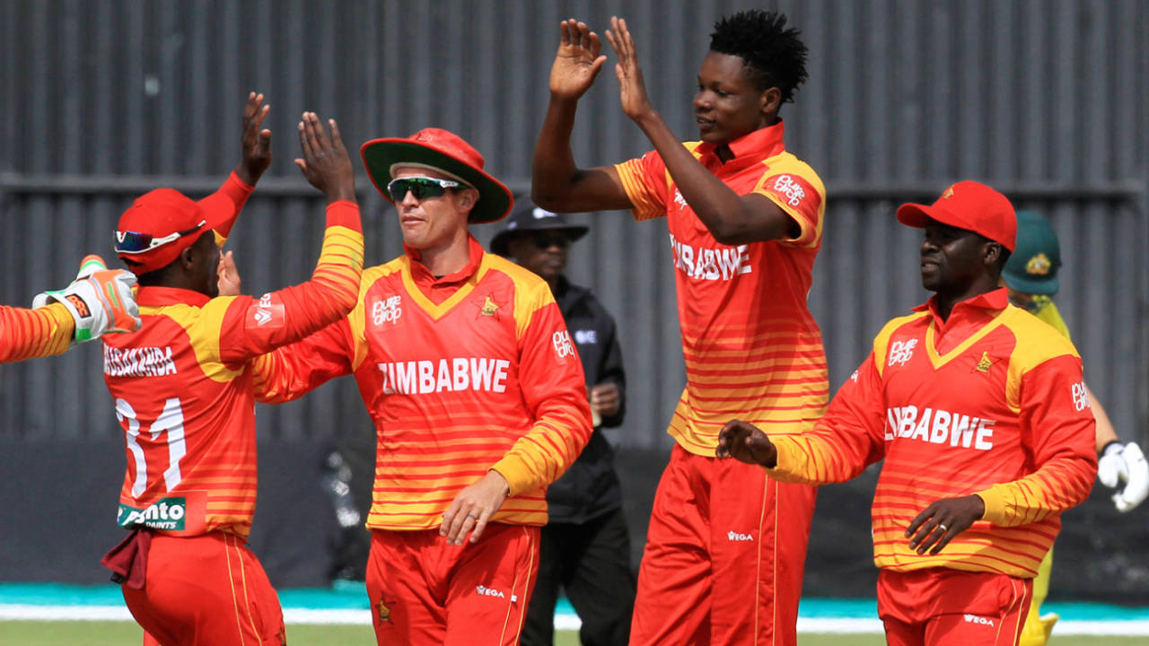 Blessing Murzarabani celebrates a wicket with his team-mates, Australia v Zimbabwe, Zimbabwe tri-series, Harare, July 6, 2018