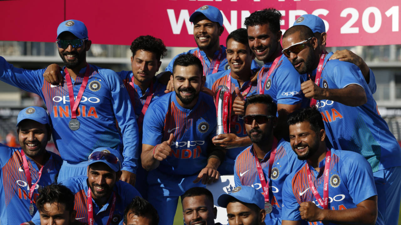 Virat Kohli poses with the trophy in the company of his team-mates, England v India, 3rd T20I, Final, Bristol, July 8, 2018