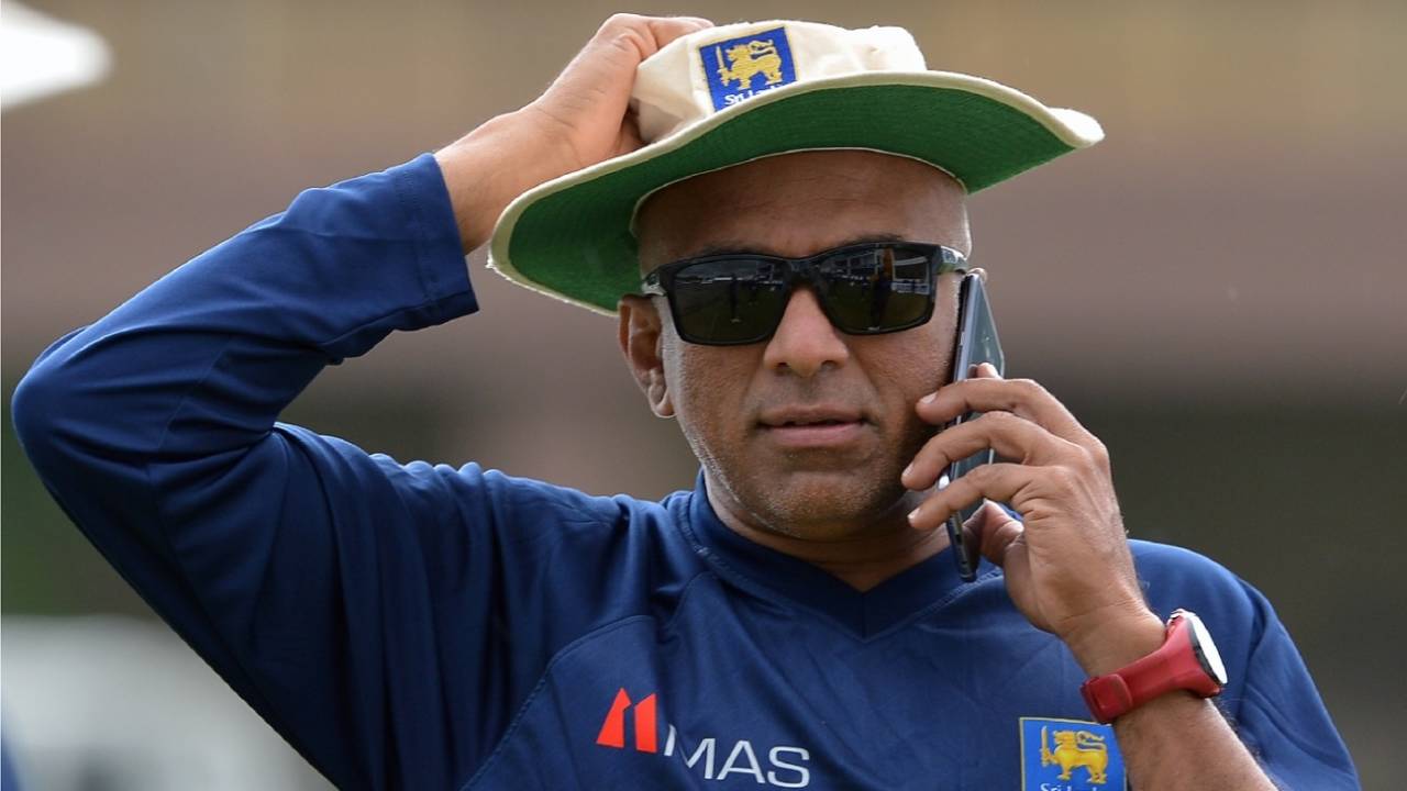 Sri Lanka coach Chandika Hathurusingha speaks on the phone during a training session&nbsp;&nbsp;&bull;&nbsp;&nbsp;Getty Images