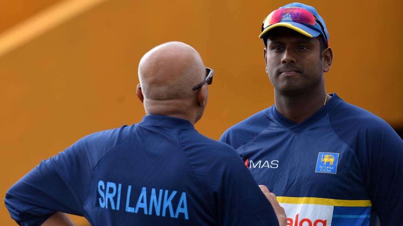 Sri Lanka coach Chandika Hathurusingha speaks to Angelo Mathews during a training session, Sri Lanka v South Africa, 1st Test, Galle, July 11, 2018