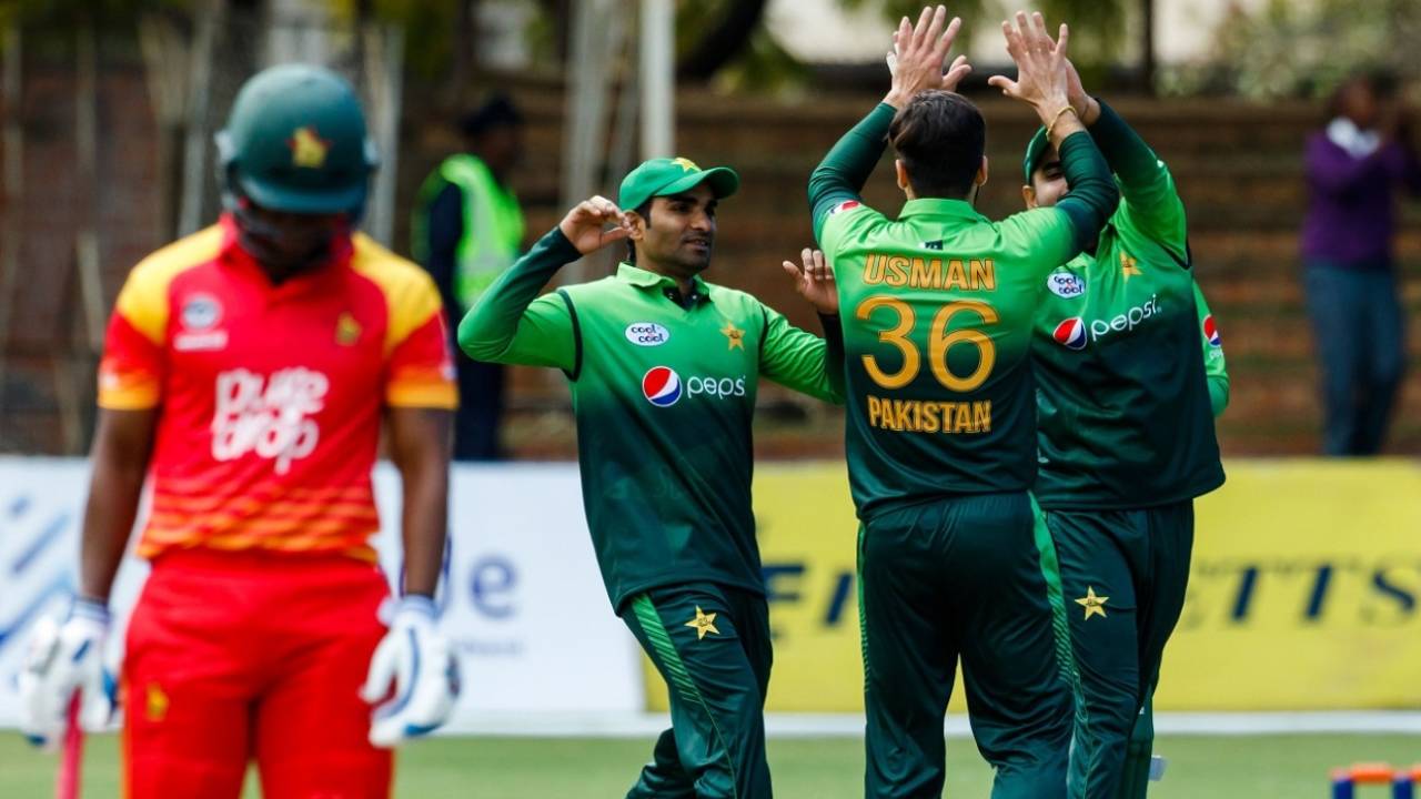 Usman Khan celebrates a wicket&nbsp;&nbsp;&bull;&nbsp;&nbsp;AFP