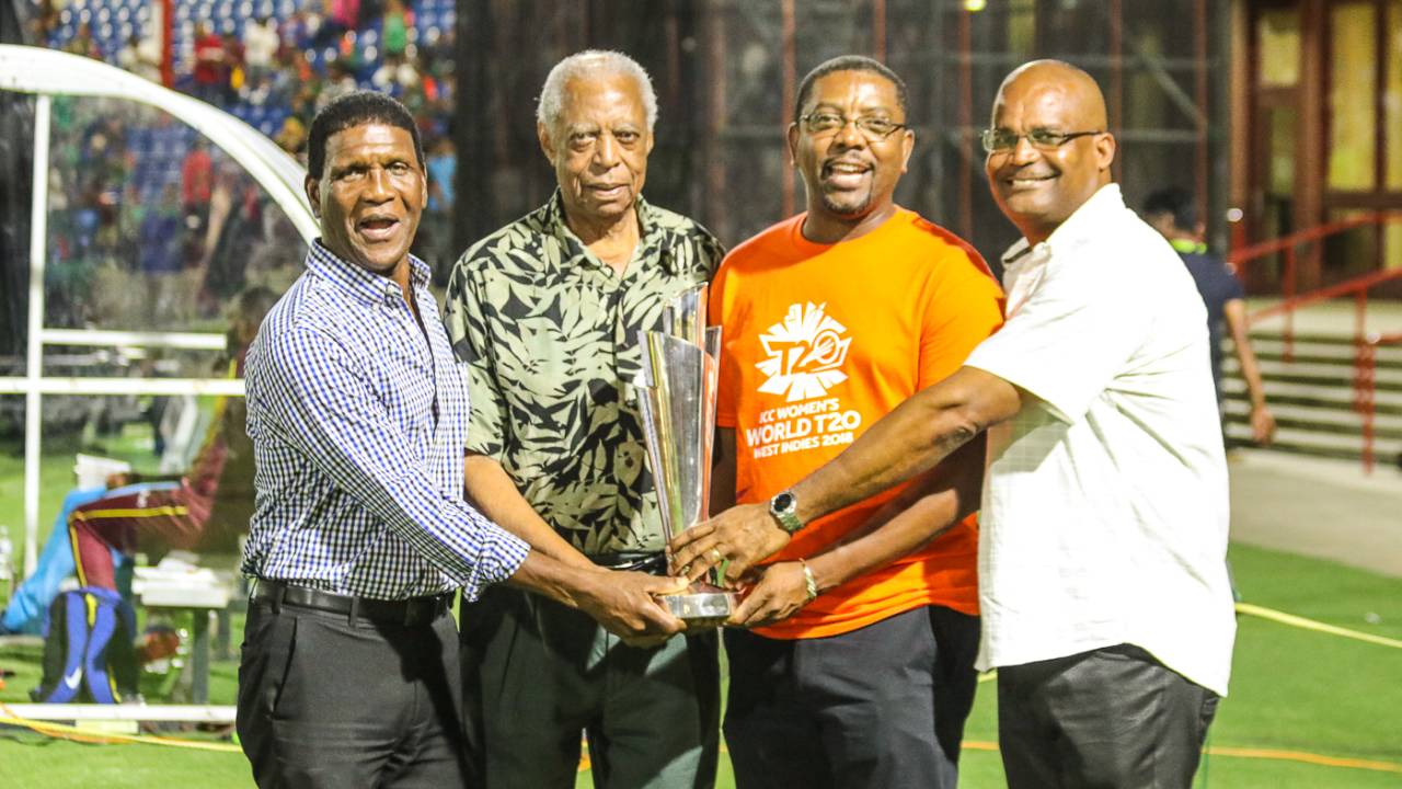 Lawrence Rowe, Lance Gibbs, CWI president Dave Cameron and vice-president Emmanuel Nanthan show off the Women's World T20 trophy