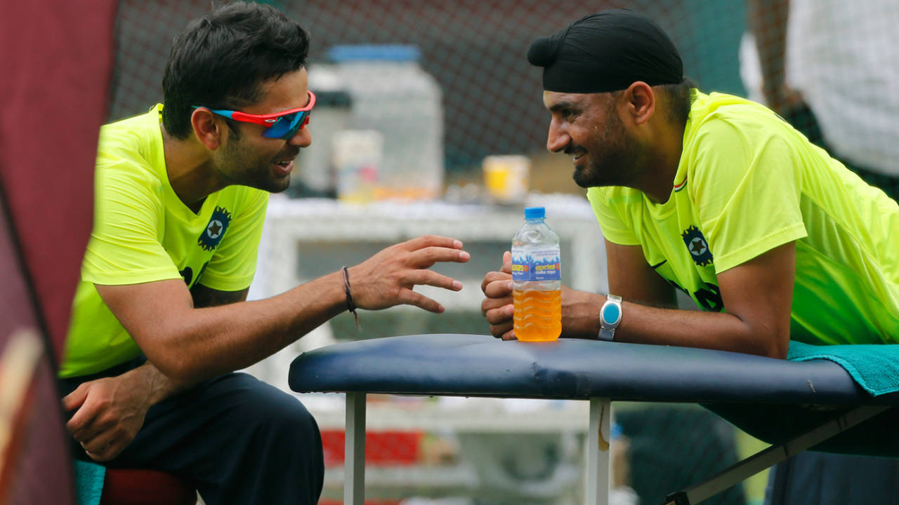 Virat Kohli and Harbhajan Singh chat during practice, World T20 2012, Colombo, September 27, 2012
