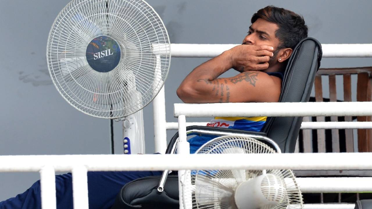Niroshan Dickwella looks on as rain stops the start of the fourth ODI, Sri Lanka v South Africa, 4th ODI, Pallekele, August 8, 2018