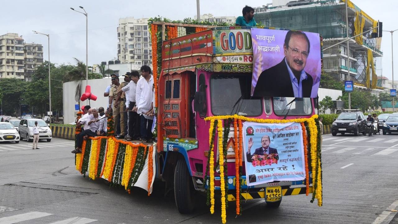 A truck carrying the body of Ajit Wadekar makes its way to a crematorium in Mumbai, August 17, 2018