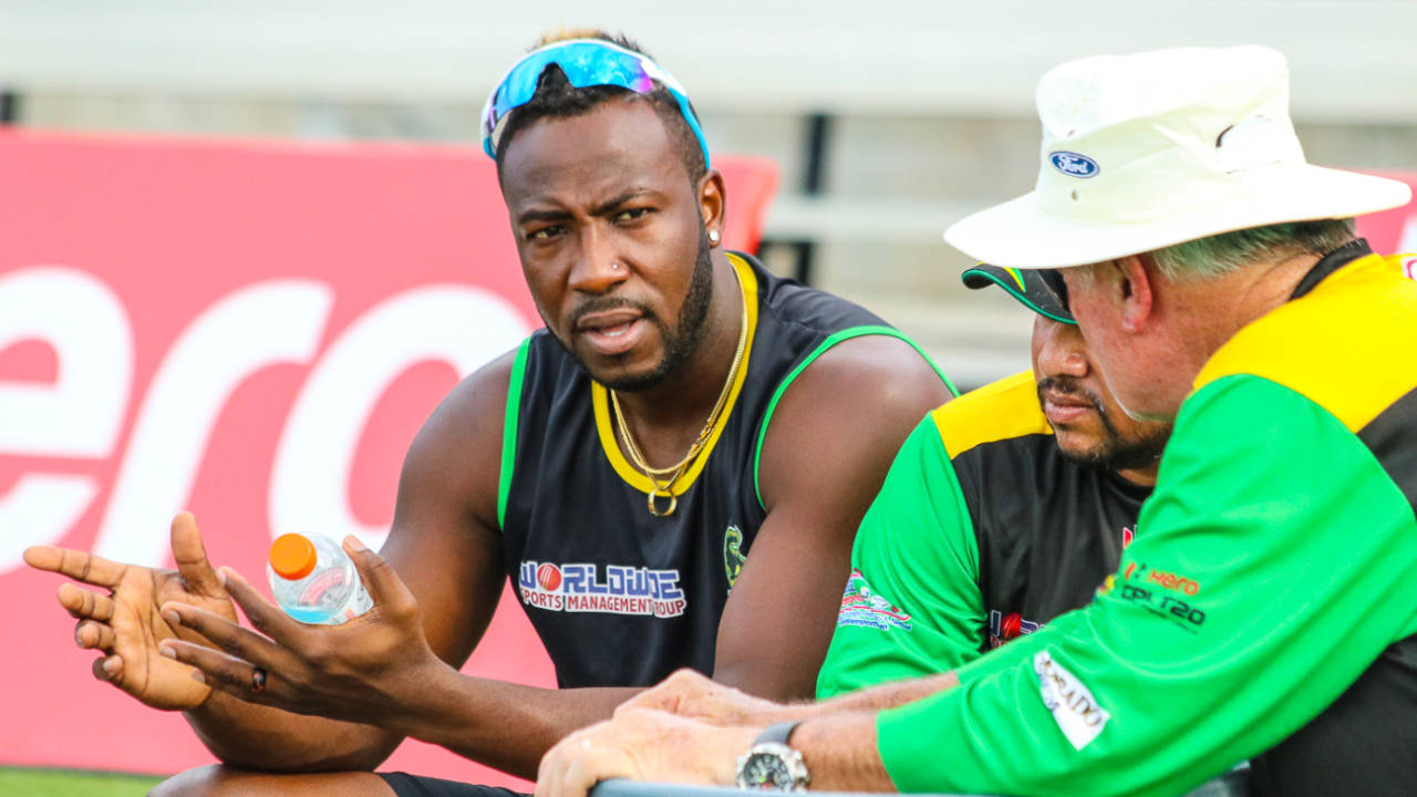 Jamaica Tallawahs captain Andre Russell chats with coaches Mark O'Donnell and Ramnaresh Sarwan during training&nbsp;&nbsp;&bull;&nbsp;&nbsp;Peter Della Penna