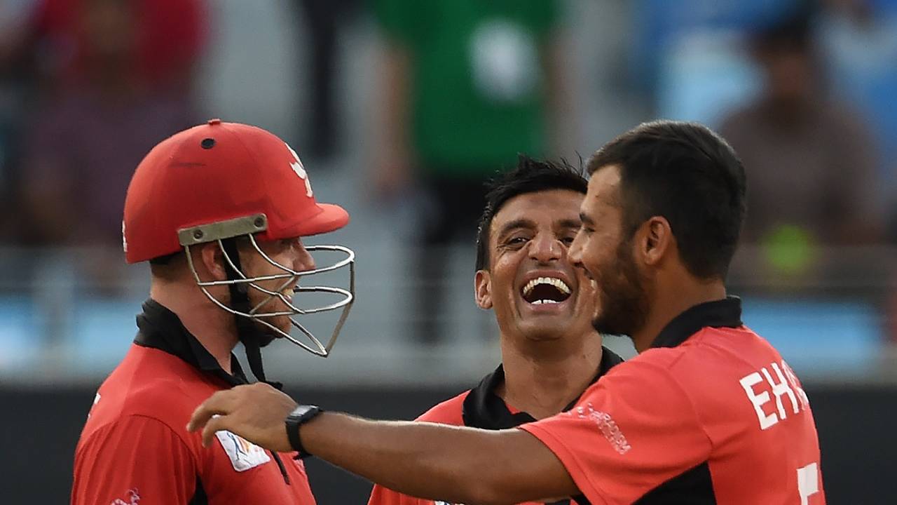 Ehsan Nawaz and Ehsan Khan celebrate Ambati Rayudu's wicket