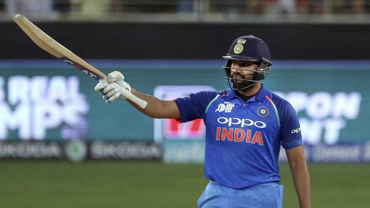 Rohit Sharma raises his bat after getting to his half-century, India v Pakistan, Asia Cup 2018, Dubai, September 19, 2018