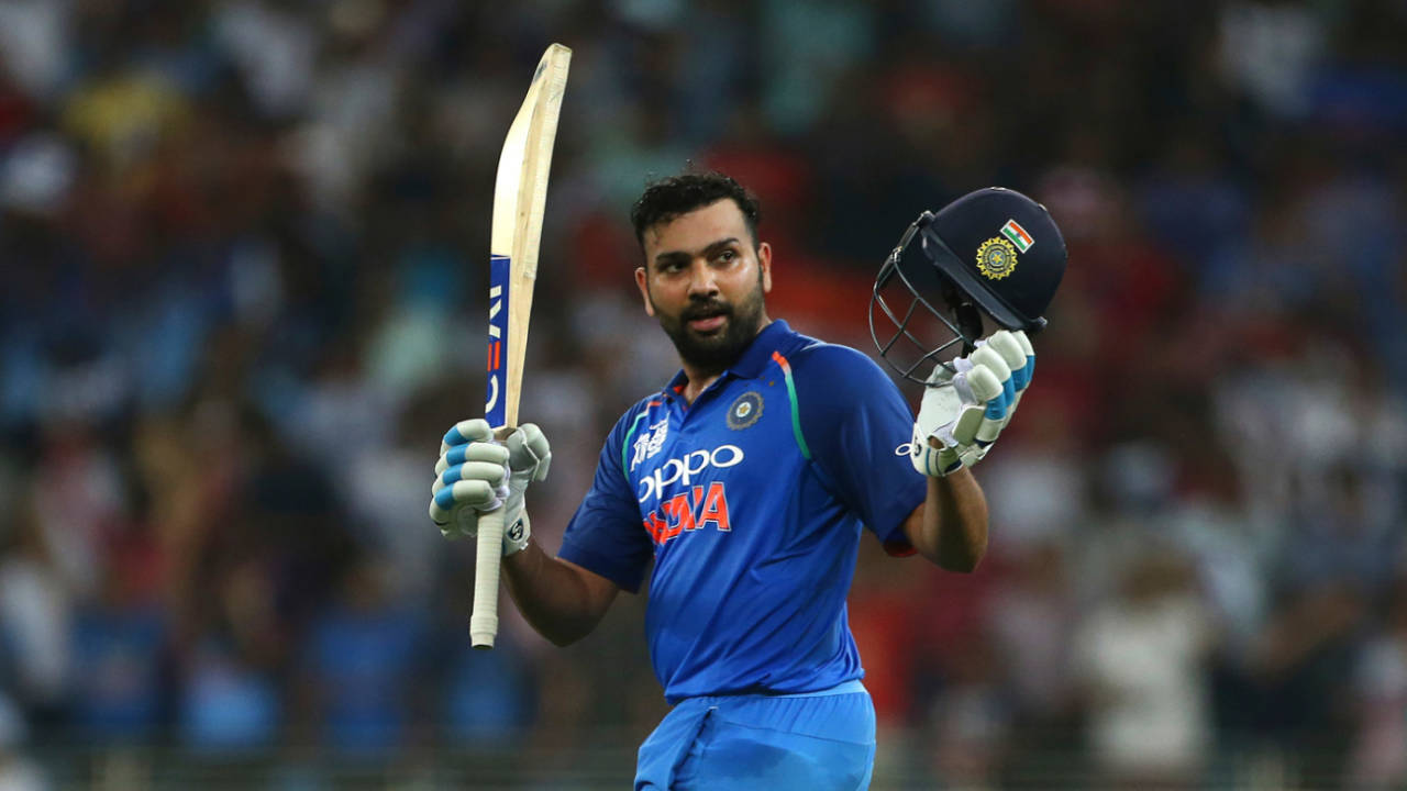 Rohit Sharma raises his bat after getting to his hundred, India v Pakistan, Super Four, Asia Cup 2018, Dubai, September 23, 2018