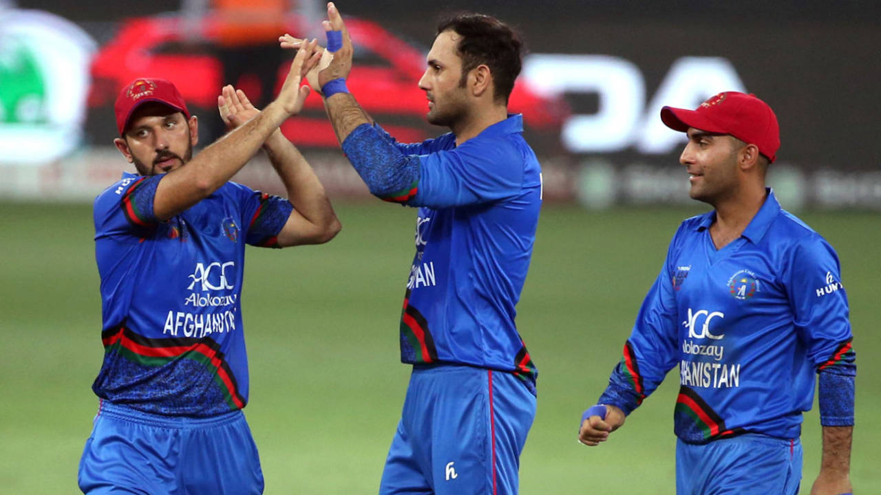 Mohammad Nabi celebrates with his team-mates after breaking a partnership, Afghanistan v India, Asia Cup 2018, Dubai, September 25, 2018