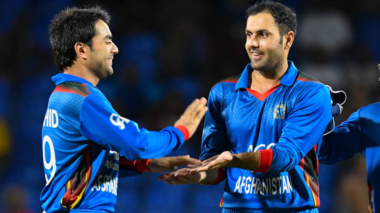 Rashid Khan and Mohammad Nabi celebrate a wicket, West Indies v Afghanistan, 2nd T20I, St Kitts, June 3, 2017