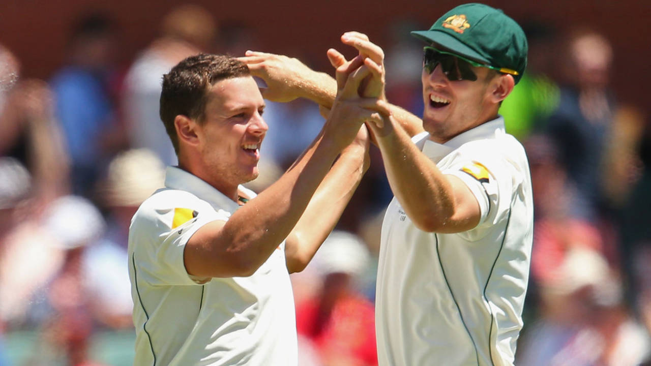 Josh Hazlewood and Mitchell Marsh celebrate a wicket, Australia v New Zealand, 3rd Test, Adelaide, 3rd day, November 29, 2015