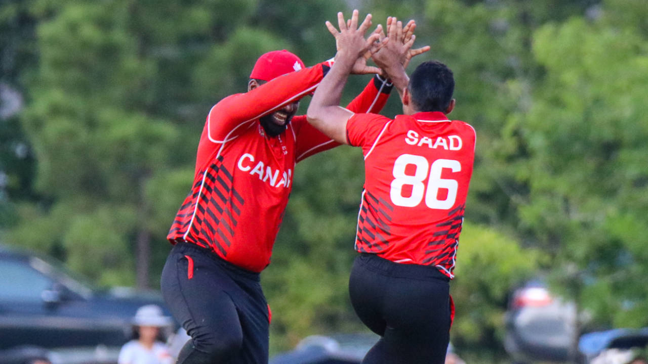 Saad Bin Zafar gets a leaping high five after taking a wicket, USA v Canada, ICC World Twenty20 Americas Sub Regional Qualifier A, Morrisville, September 22, 2018
