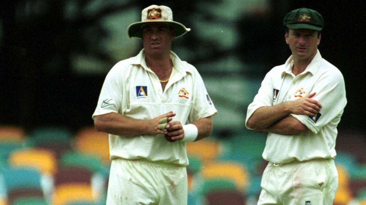 Shane Warne and Steve Waugh look on during a Test match, Australia v Pakistan, 1st Test, Brisbane, November 8, 1999