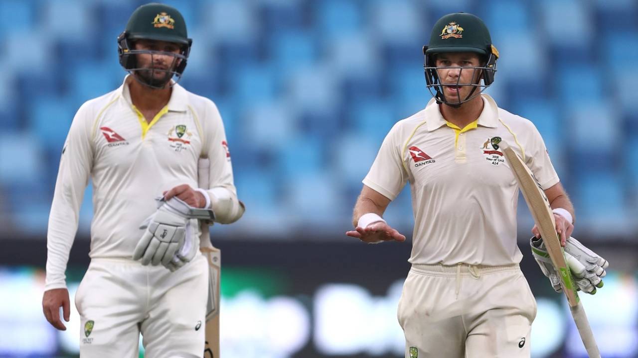 Tim Paine and Nathan Lyon walk back after salvaging a draw for Australia, Pakistan v Australia, 1st Test, Dubai, 5th day, October 11, 2018