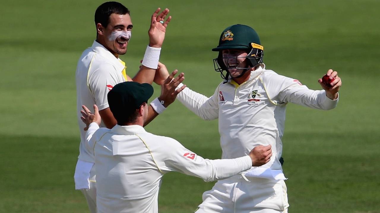 Mitchell Starc and Marnus Labuschagne celebrate Mohammad Hafeez's dismissal, Pakistan v Australia, 1st Test, Abu Dhabi, 1st day, October 16, 2018 